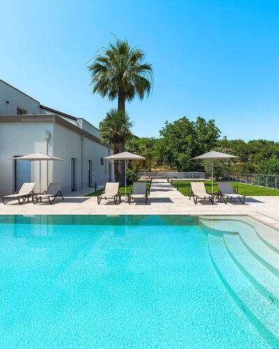 Villa Cloris: Blue, Water, Swimming Pool, Composite Material, Reflecting Pool, Resort, Reflection, Shade, Eco Hotel, Estate