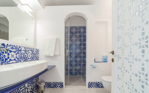 Villa Desideria: Blue, Flooring, Plumbing Fixture, Floor, Bathroom, Interior Design, Tile, Mosaic, Plumbing, Ceramic