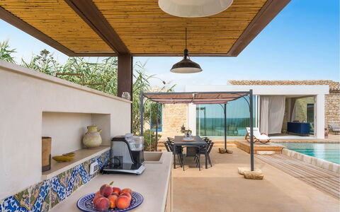 Villa Smeralda: Flooring, Floor, Furniture, Home, Composite Material, Resort, Swimming Pool, Chair, Tile, Shade