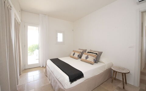 Villa Il Guaceto: Wall, Bed, Furniture, Bedroom, Interior Design, Floor, Flooring, Home, Ceiling, Bedding