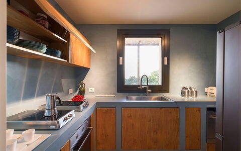 Villa Miriam: Kitchen, Countertop, Furniture, Interior Design, Wood, Cabinetry, Kitchen Appliance, Flooring, Lighting, Home