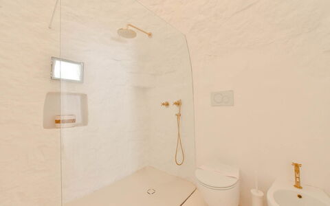 Trulli Fontana: Wall, Plumbing Fixture, Flooring, Bathroom, Floor, Lighting, Ceiling, Interior Design, Plumbing, Light Fixture