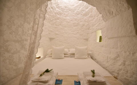 Trulli Fontana: Lighting, Bedroom, Bed, Room, Bedding, Bed Sheet, Linens, Comfort, Pillow, Light Fixture