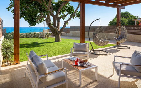 Villa Paprika: Furniture, Outdoor Furniture, Chair, Table, Shade, Resort, Wood Stain, Hardwood, Garden