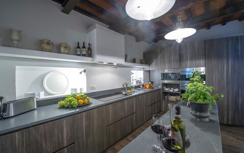 Villa Marinella: Kitchen, Interior Design, Countertop, Light Fixture, Lighting, Ceiling, Furniture, Cabinetry, Home, Plumbing Fixture