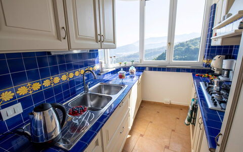 Villa Pietraluna: Kitchen, Major Appliance, Kitchen Appliance, Countertop, Kitchen Sink, Kitchen Stove, Cabinetry, Gas Stove, Stove, Tile
