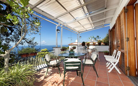 Villa Mary: Furniture, Porch, Outdoor Furniture, Chair, Table, Flowerpot, Balcony, Outdoor Table, Resort, Houseplant