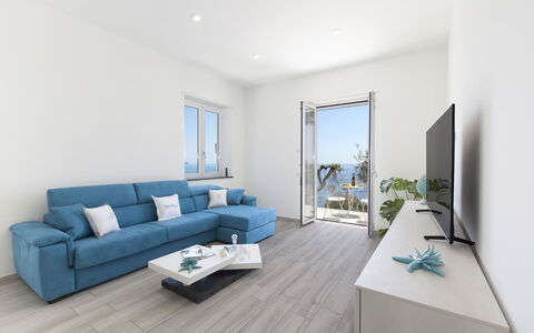 Villa del Cantone: Furniture, Flooring, Floor, Apartment, Interior Design, Table, Home, Living Room, Chair, Couch