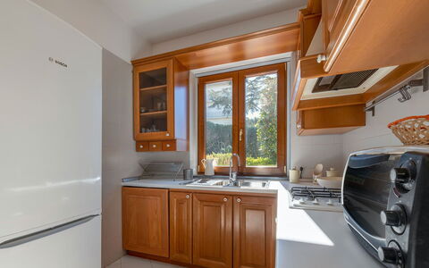 Villa Ava: Kitchen, Kitchen Appliance, Major Appliance, Wood, Countertop, Cabinetry, Kitchen Sink, Interior Design, Furniture, Home Appliance