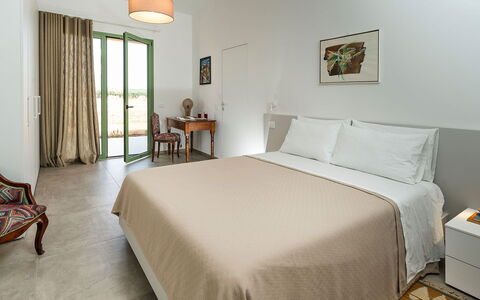 Villa Clemente: Furniture, Wall, Wood, Flooring, Interior Design, Floor, Bed, Bedroom, Table, Home