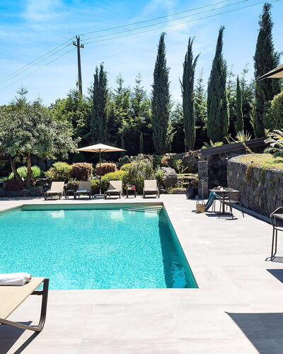 Villa Monte Serra: Swimming Pool, Outdoor Furniture, Resort, Shade, Eco Hotel, Furniture, Composite Material, Umbrella, Flagstone, Leisure