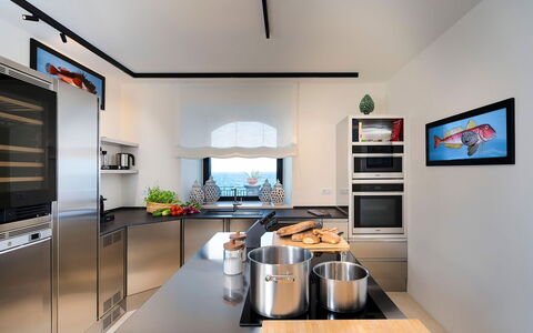Villa Pozzillo: Furniture, Kitchen, Interior Design, Kitchen Appliance, Countertop, Ceiling, Light Fixture, Flooring, Major Appliance, Lighting