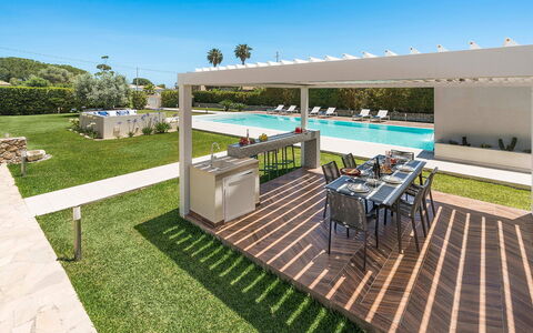 Villa Agorà: Shade, Garden, Outdoor Furniture, Leisure, Landscaping, Resort, Outdoor Structure, Backyard, Eco Hotel, Artificial Turf