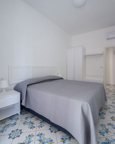 Maison Maiori: Flooring, Floor, Interior Design, Room, Ceiling, Apartment, Bedroom, Tile, Wood Flooring