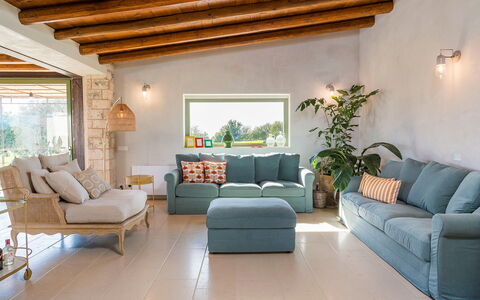 Villa del Sole: Furniture, Interior Design, Couch, Flooring, Table, Wood, Floor, Living Room, Chair, Room