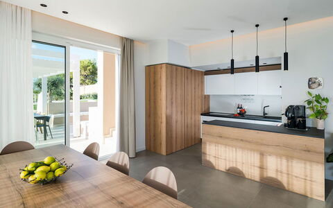 Villa Cornino: Furniture, Kitchen, Interior Design, Countertop, Flooring, Cabinetry, Floor, Wood, Ceiling, Home