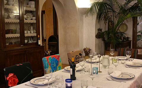 Villa Madonna di Costantinopoli: Tablecloth, Table, Furniture, Tableware, Linens, Dishware, Serveware, Food, Plate, Drinkware