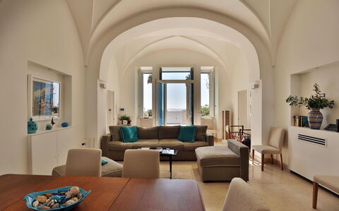 Casa Leuca: Furniture, Interior Design, Flooring, Table, Chair, Room, Floor, Lighting, Ceiling, Living Room