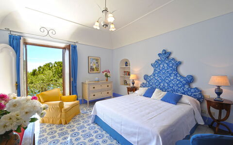 Little Mansour: Blue, Furniture, Interior Design, Bedroom, Flooring, Floor, Lighting, Linens, Table, Bed