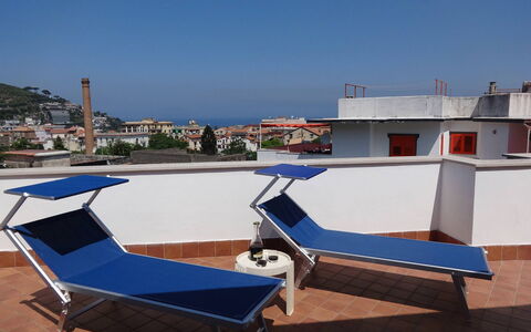 Apartment Snicher: Apartment, Balcony, Outdoor Furniture, Shade, Resort, Condominium, Chair, Hotel, Eco Hotel, Houseplant