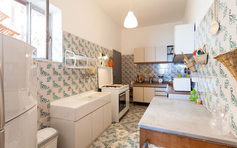 Casa Annalu: Flooring, Floor, Interior Design, Major Appliance, Kitchen, Tile, Room, Countertop, Kitchen Appliance, Ceiling