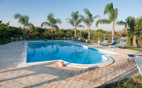 Villa Athena: Swimming Pool, Resort, Leisure, Shade, Composite Material, Eco Hotel, Outdoor Furniture, Flagstone, Tile, Umbrella