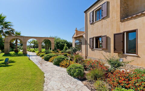 Villa Athena: Shrub, Garden, Architecture, Home, Estate, Landscaping, Hacienda, Yard, Villa