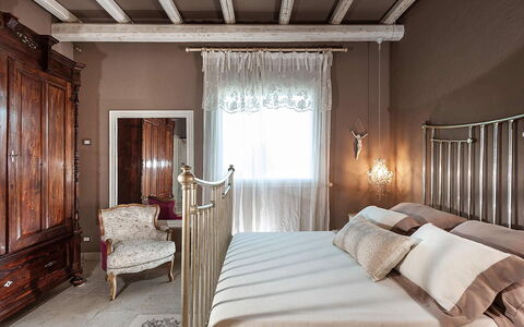 Villa la Pigna: Furniture, Interior Design, Bed, Bedroom, Wall, Lighting, Textile, Room, Home, Flooring