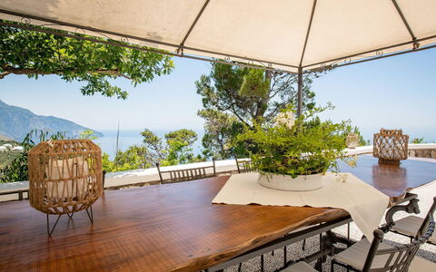 Villa Lamaro: Furniture, Table, Chair, Kitchen & Dining Room Table, Resort, Coastal And Oceanic Landforms, Outdoor Furniture, Outdoor Table, Flowerpot, Sea