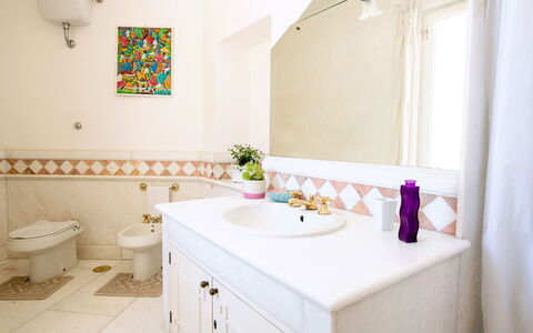 Villa Lamaro: Flooring, Interior Design, Floor, Plumbing Fixture, Bathroom, Bathroom Sink, Plumbing, Bathroom Cabinet, Tap, Sink