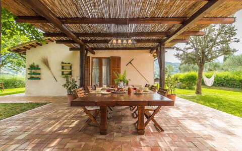 Villa Molinazzo 10: Furniture, Wood, Flooring, Table, Kitchen & Dining Room Table, Chair, Garden, Outdoor Furniture, Porch, Outdoor Table