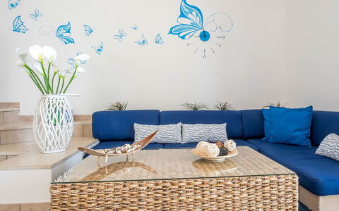 Villa Sea Breeze: Furniture, Blue, Interior Design, Couch, Wall, Living Room, Home, Textile, Throw Pillow, Room