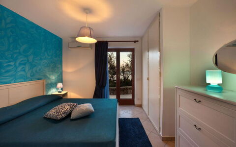 Villa Sea Breeze: Interior Design, Furniture, Flooring, Floor, Bedroom, Textile, Bed, Room, Lighting, Ceiling