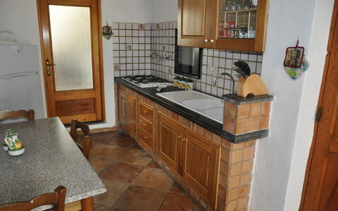 Casa 2 Ulivi: Kitchen, Countertop, Flooring, Cabinetry, Kitchen Appliance, Furniture, Wood, Interior Design, Floor, Major Appliance
