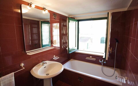 Casa Amalfitana: Bathroom, Bathroom Sink, Plumbing Fixture, Sink, Tap, Plumbing, Flooring, Interior Design, Bathtub, Floor