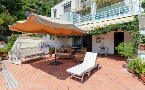 Casa Dorothea 3: Flowerpot, Balcony, Houseplant, Outdoor Furniture, Resort, Chair, Shade, Eco Hotel, Awning, Umbrella