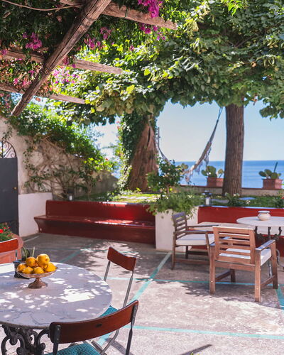 Casa Giardino: Furniture, Table, Sea, Flowerpot, Chair, Outdoor Furniture, Outdoor Table, Shade, Coast