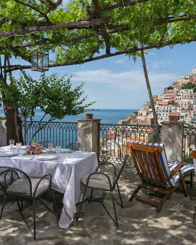 Casa la Sponda: Furniture, Table, Chair, Outdoor Table, Outdoor Furniture, Tablecloth, Flowerpot, Restaurant, Balcony, Houseplant