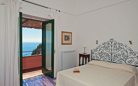 Positano View: Floor, Flooring, Sea, Furniture, Ocean, Coast, Houseplant, Resort, Hardwood, Wood Stain