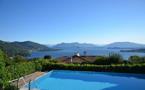 Verbano: Blue, Water, Body Of Water, Mountainous Landforms, Swimming Pool, Mountain, Hill, Coastal And Oceanic Landforms, Resort, Mountain Range