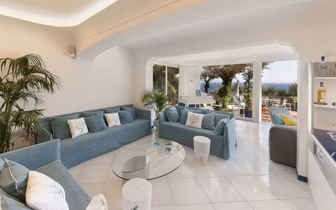 Villa Avion: Furniture, Interior Design, Couch, Flooring, Floor, Living Room, Table, Ceiling, Apartment, Room