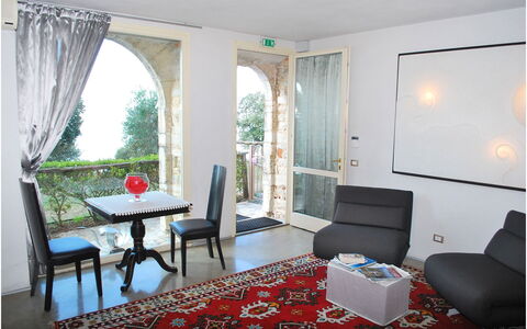 Villa Bastiano: Furniture, Interior Design, Flooring, Floor, Lighting, Room, Couch, Table, Apartment, Living Room