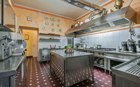 Villa Camilla: Kitchen, Countertop, Interior Design, Lighting, Kitchen Appliance, Ceiling, Flooring, Kitchen Stove, Furniture, Major Appliance
