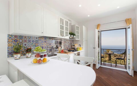 Villa del Saraceno: Furniture, Interior Design, Kitchen, Flooring, Floor, Countertop, Kitchen Appliance, Ceiling, Major Appliance, Home