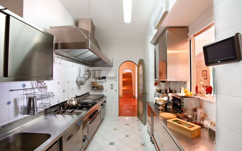 Villa Elyseum: Kitchen, Countertop, Interior Design, Kitchen Appliance, Major Appliance, Flooring, Lighting, Ceiling, Floor, Cabinetry