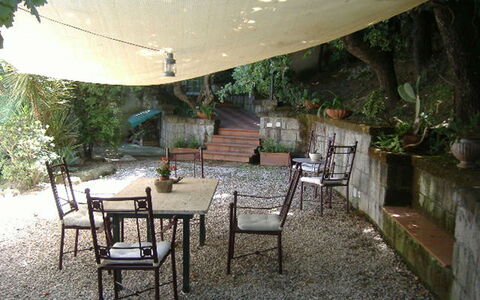 Villa Ettore: Furniture, Table, Chair, Outdoor Furniture, Outdoor Table, Shade, Backyard, Garden, Flagstone, Coffee Table
