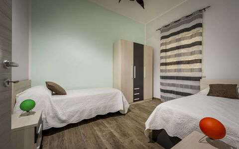 Villa Gea: Floor, Flooring, Interior Design, Wood, Furniture, Bedroom, Ceiling, Room, Bed, Lighting