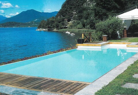 Villa Isa: Blue, Water, Swimming Pool, Resort, Composite Material, Leisure, Eco Hotel, Shade, Water Feature, Outdoor Furniture