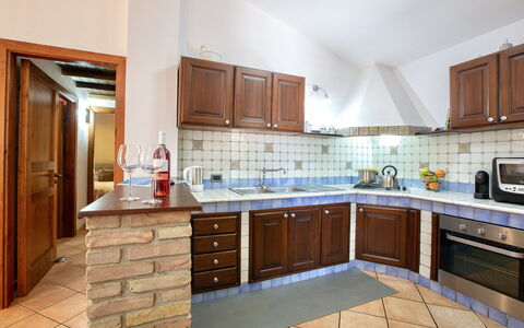 Villa Isabella: Kitchen, Countertop, Kitchen Appliance, Interior Design, Major Appliance, Cabinetry, Furniture, Flooring, Ceiling, Home Appliance