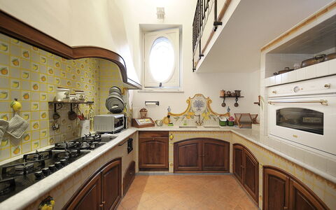 Villa Marion: Kitchen, Interior Design, Countertop, Wood, Flooring, Furniture, Cabinetry, Kitchen Stove, Lighting, Floor